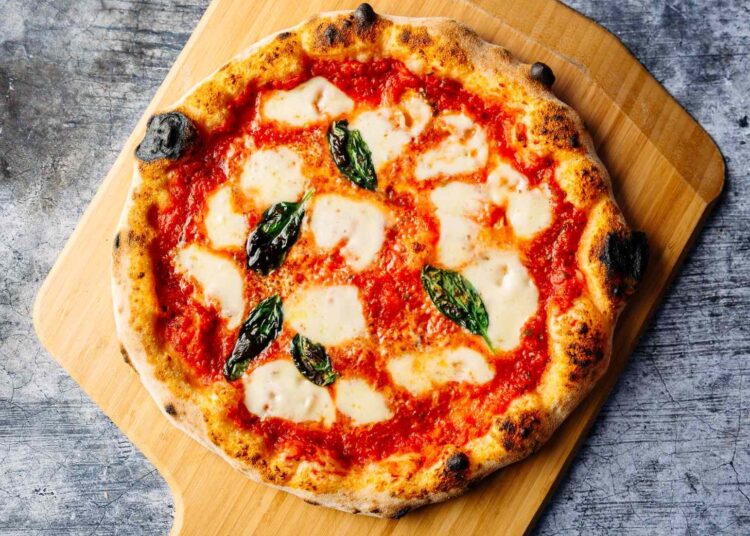 Carlos Pizza: The World Famous Mexican Restaurant